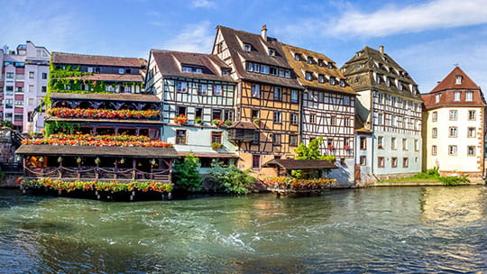Traditional houses lining a canal in Strasbourg, France